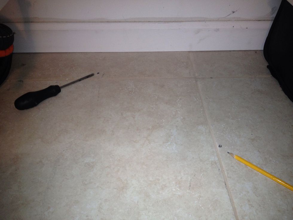 In retrospect, I should have moved it a little off of the grout line, as it was pretty tough to drill through