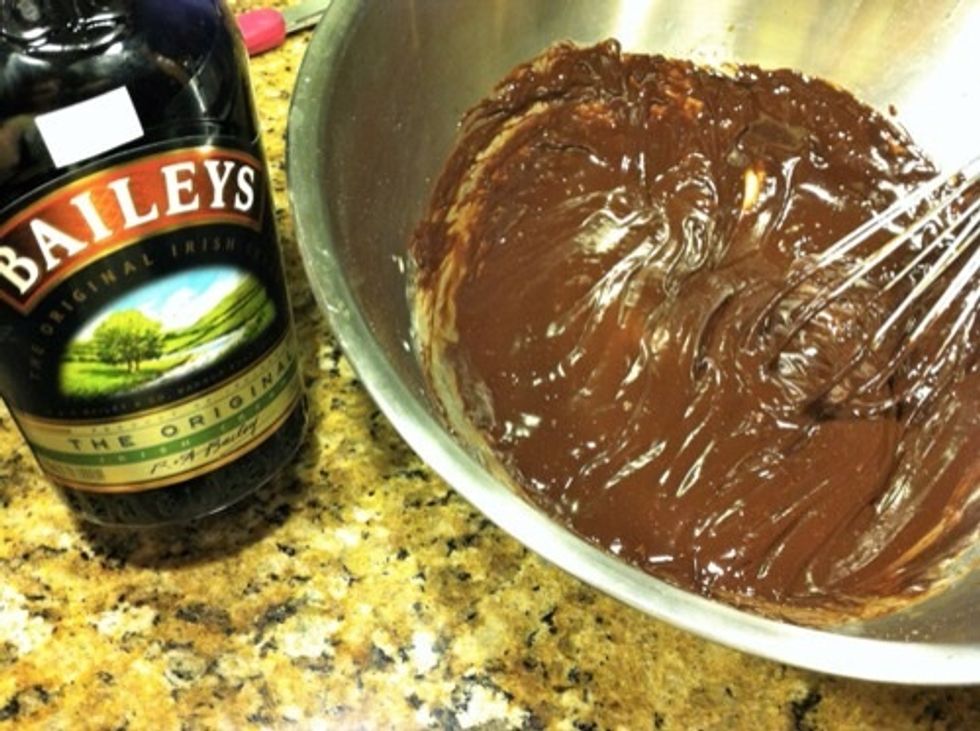 In saucepan, heat cream until simmering. Pour over chocolate, let sit for 1 minute, then stir until smooth. Add butter and Bailey's then stir until smooth.