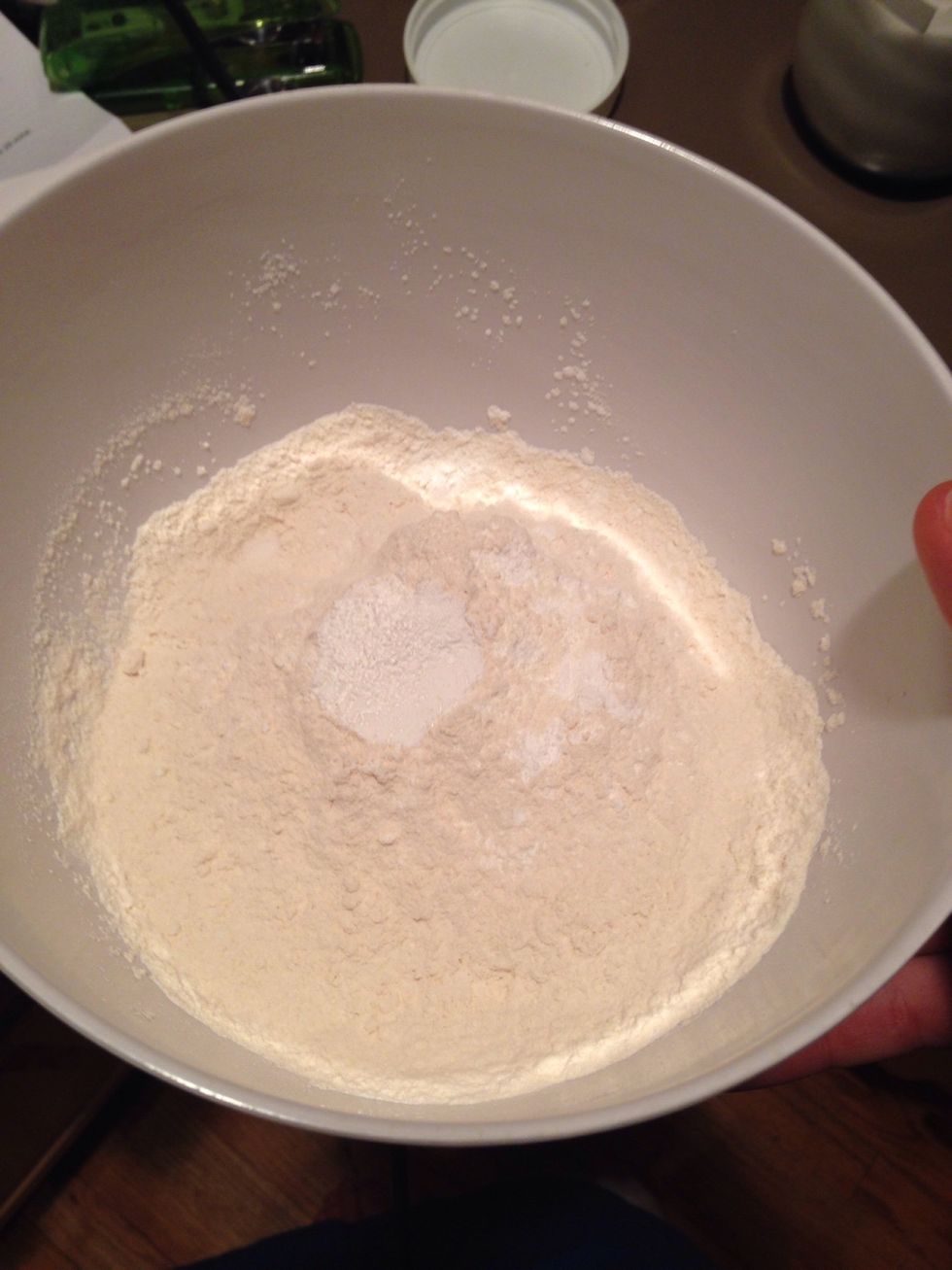 In separate bowl combine flour, baking powder, and salt