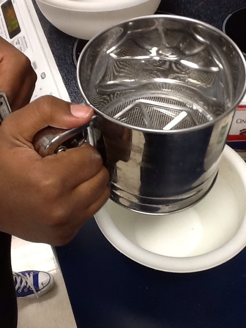 In small bowl sift together remaining 2 tablespoons of sugar