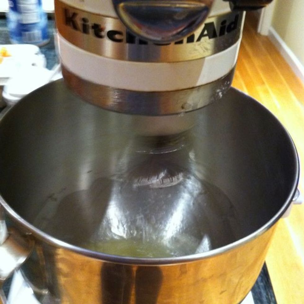 In the bowl of an electric mixer with the whisk attachment, whisk on medium speed until the eggs are very white and just beginning to hold their shape