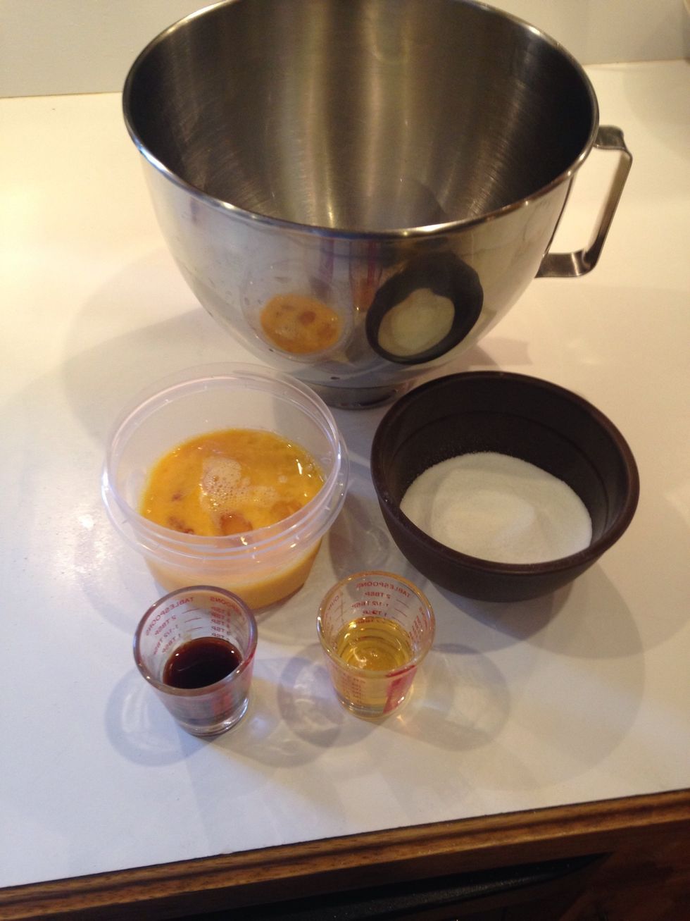 In the bowl of your stand mixer combine the whole eggs, granulated sugar, vanilla and honey.