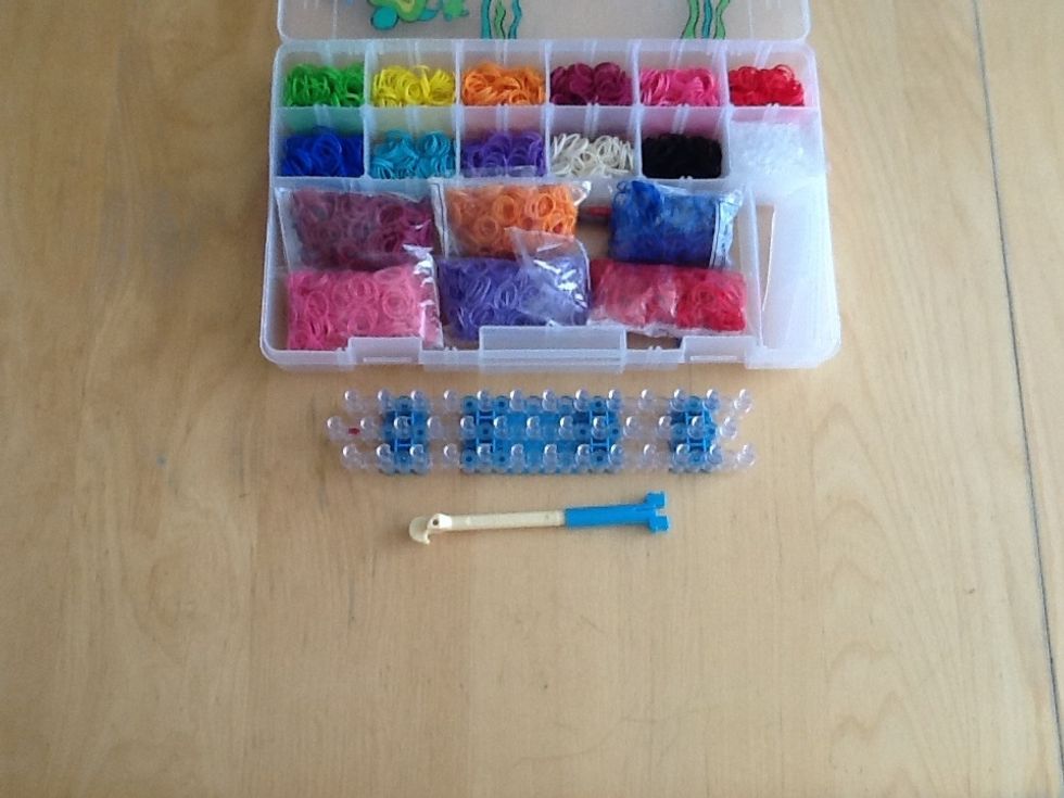 In the box there is a loom, a hook, and rubber bands. You can get the box, the case and more rubber bands at the Learning Express Toys store.