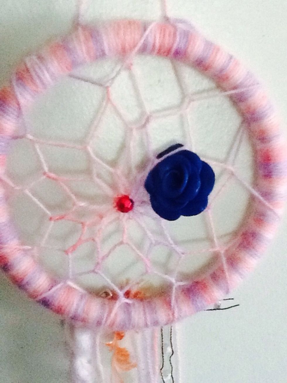 In the centre, I also made a clay rose, baked it, glazed it, and drilled a hole through the base, before sewing onto the web. Personalize it to suit you!