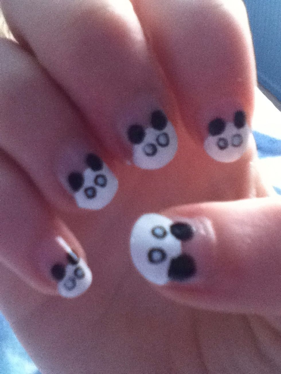 In the centre of these put two small white dots.