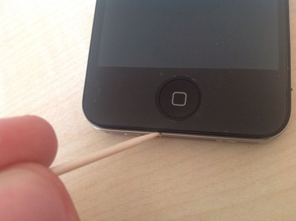 In the end you can use the other side of the toothpick to clean the edges of your iPhone.