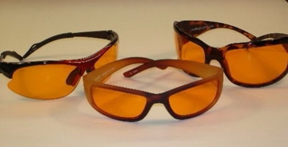 In the evening, try wearing orange colored glasses that block blue light, as blue light has the most negative impact on melatonin production in the brain
