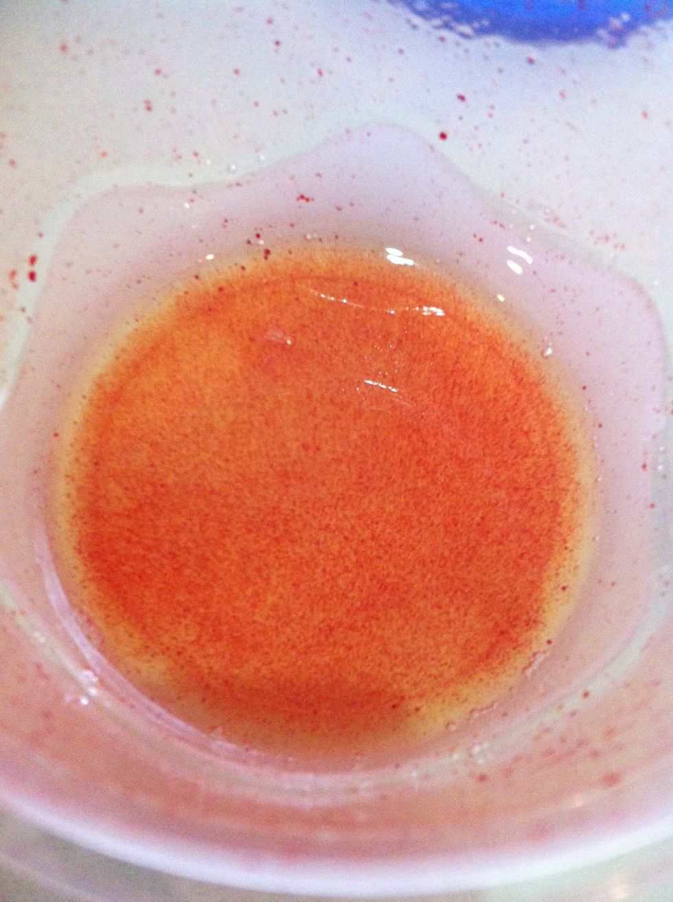 In the jar, mix together about a teaspoon of your scented oil of choice, 5 teaspoons of vegetable oil and around 10 drops of food colouring.