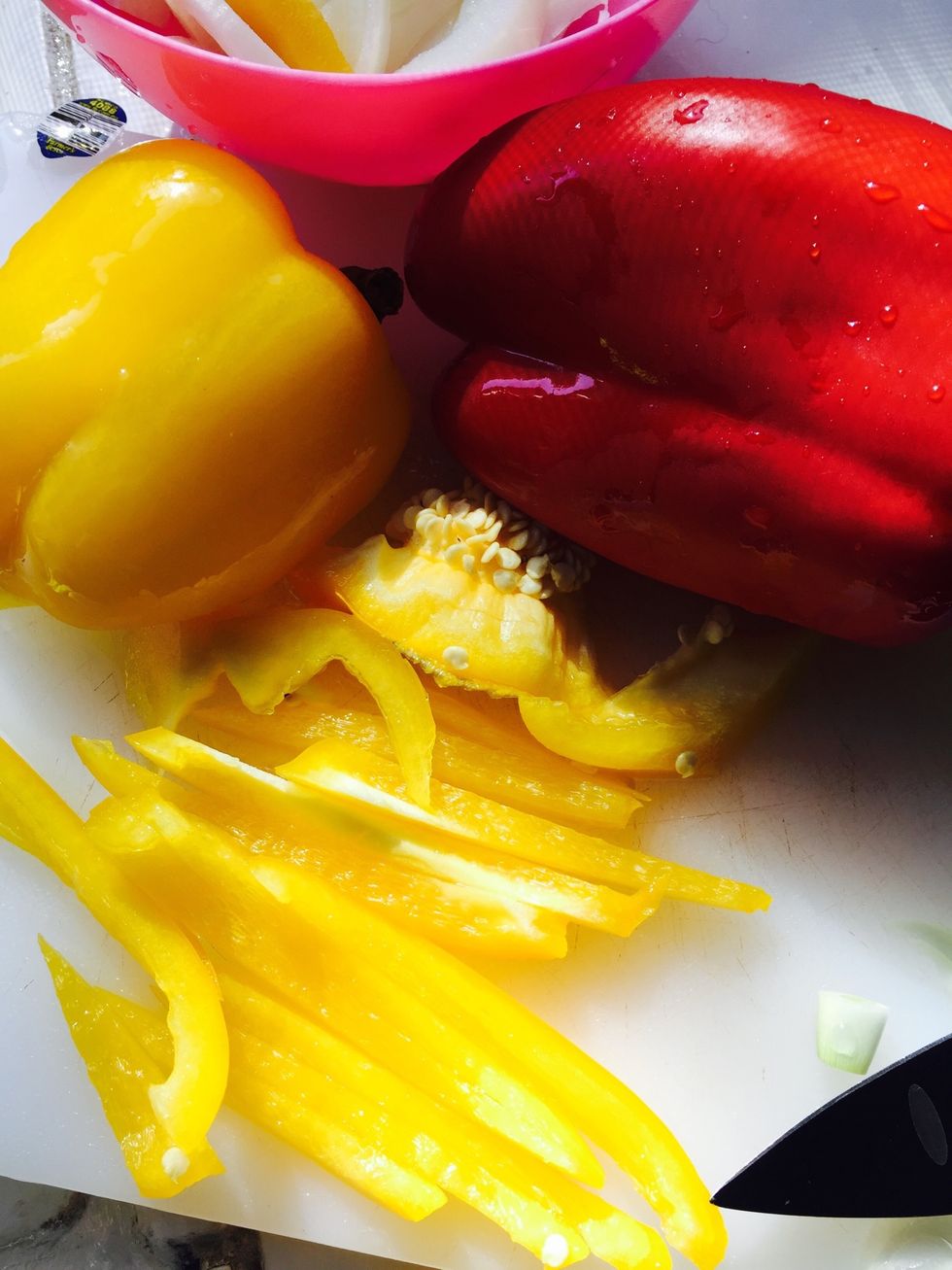 In the mean time julienne your onions and bell peppers