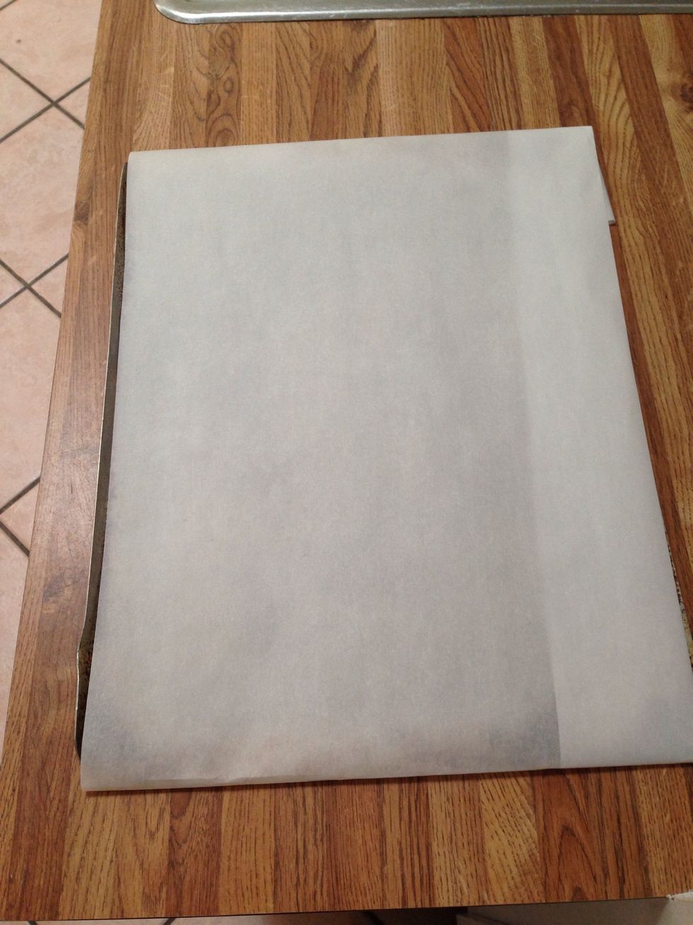 In the meantime cover a cookie sheet with parchment paper.
