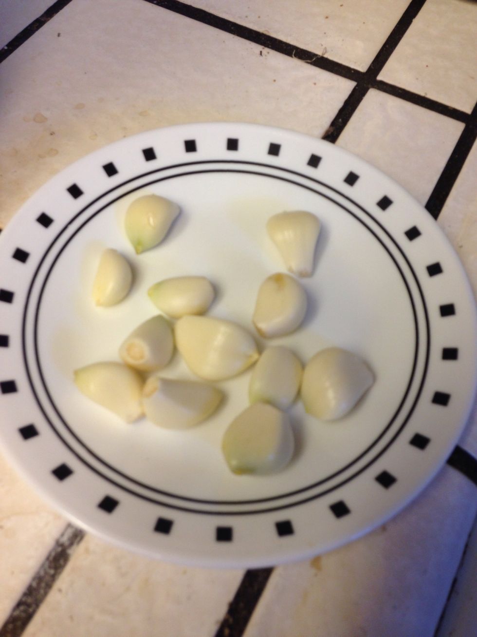 In the meantime peel the garlic, you will need about a dozen cloves
