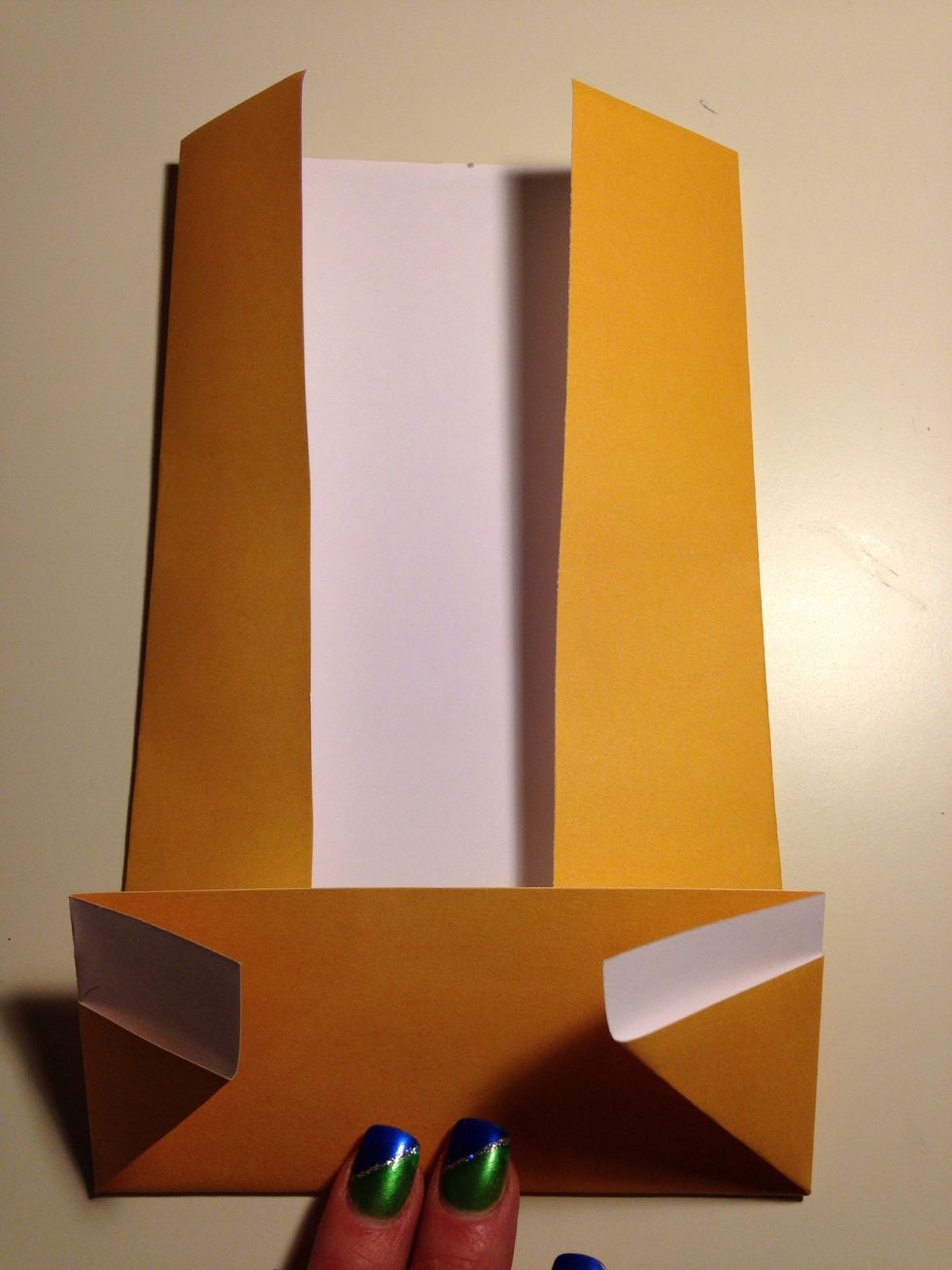 In the next step, I turn the paper around in the video. It doesn't matter which way you start.