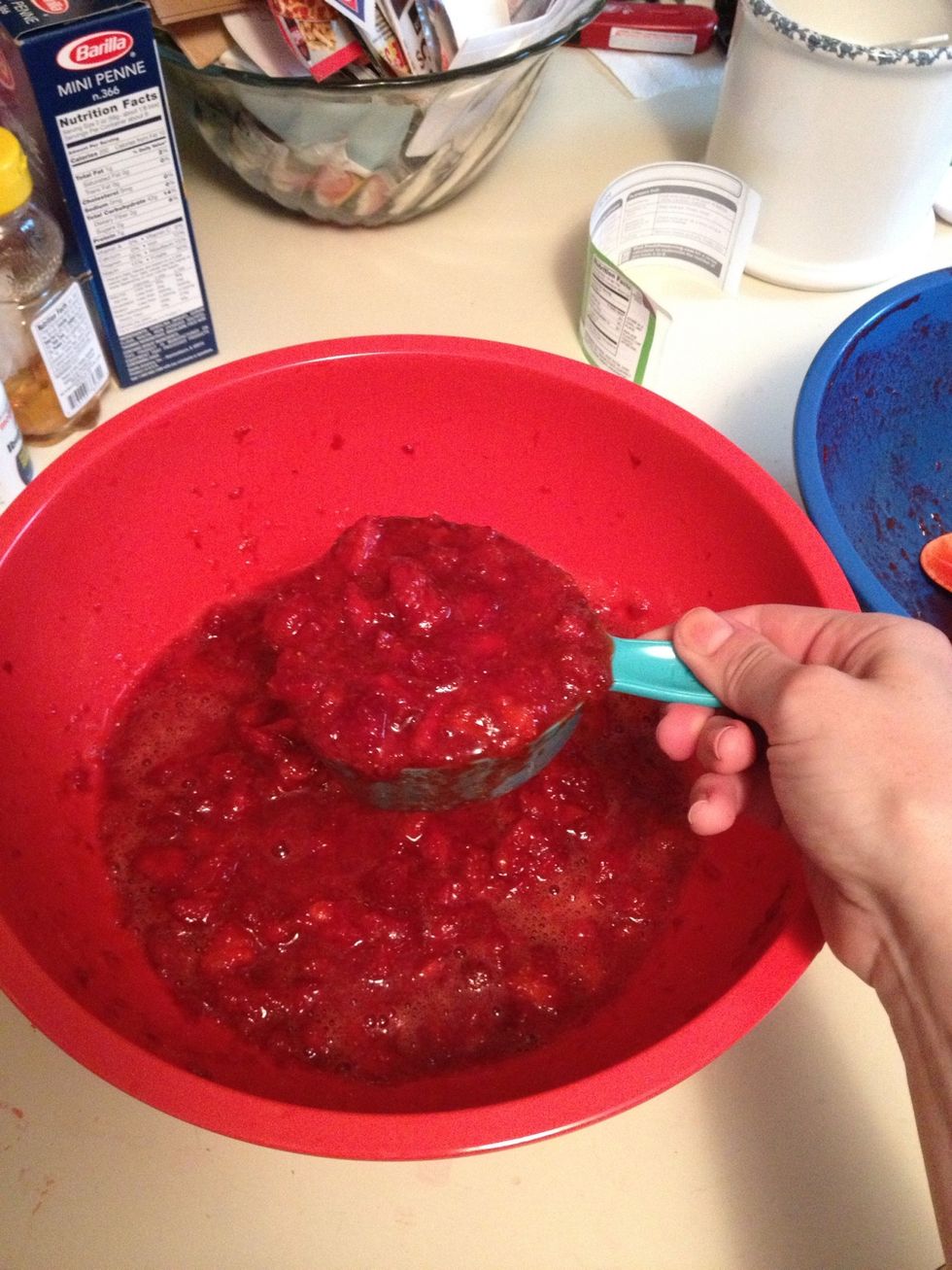 In the other bowl measure out 1 2/3 of a cup of your mashed up strawberries. And it's okay to do this a double batch at a time- we did.