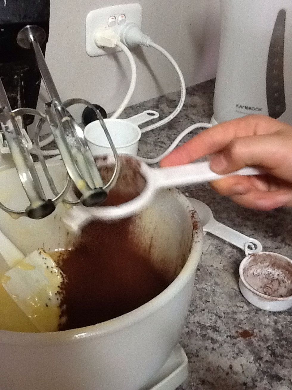In the other half of the batter you are going to add 1/3 of cocoa powder and make sure that you sift the cocoa.