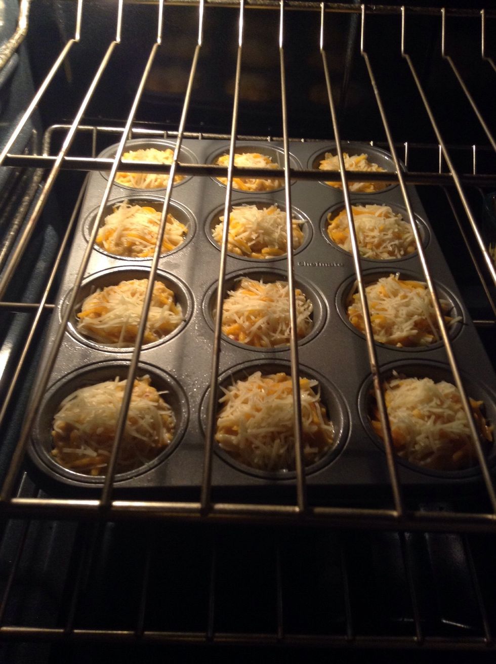 In the oven... Bake for 30 mins or until the cheese is melted and golden brown!