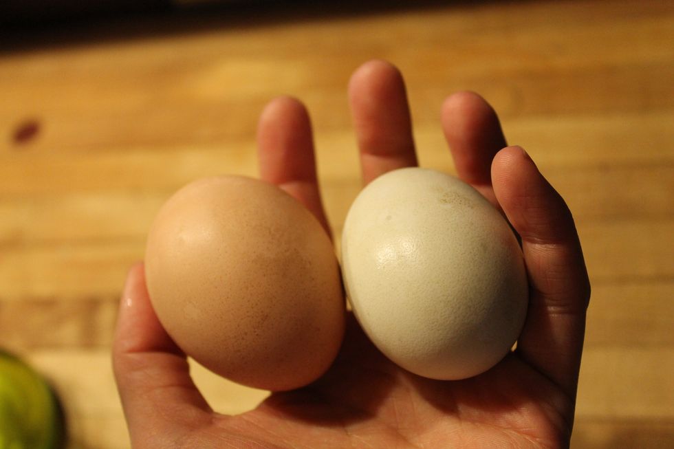 In the pan you saut\u00e9ed your mushrooms & green onion, fry two eggs. Season eggs lightly with seasoned salt.