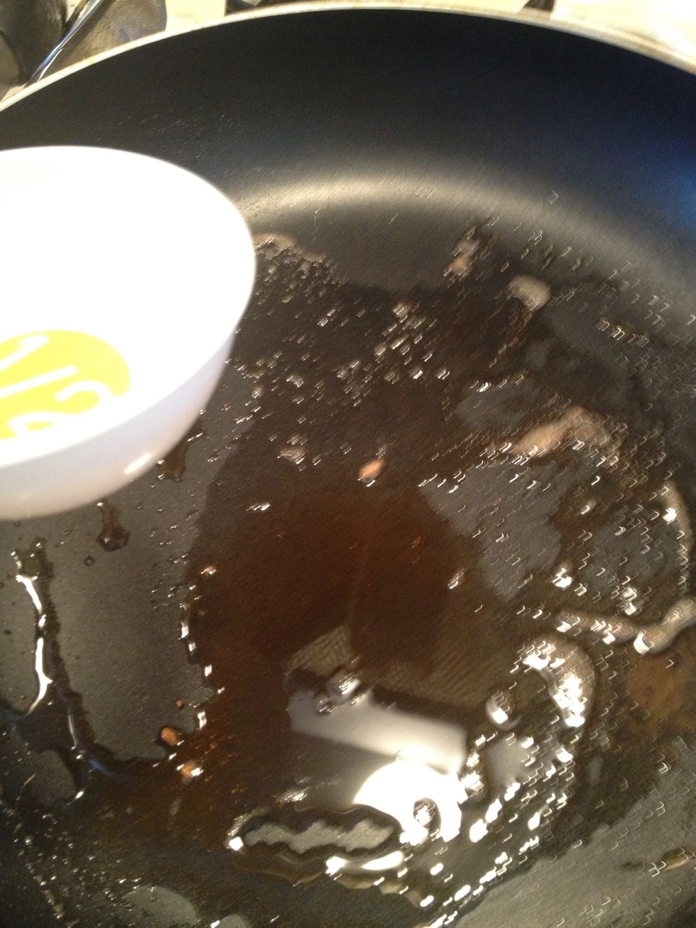 In the same pan we cooked the chicken lower the heat and add the wine.