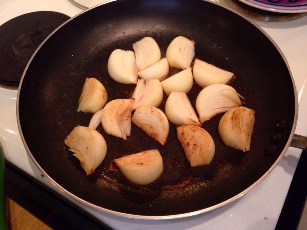 In the same pan you used to brown the meat, add a little oil and fry the onions. You want a good colour on the onions but caution not to burn them.