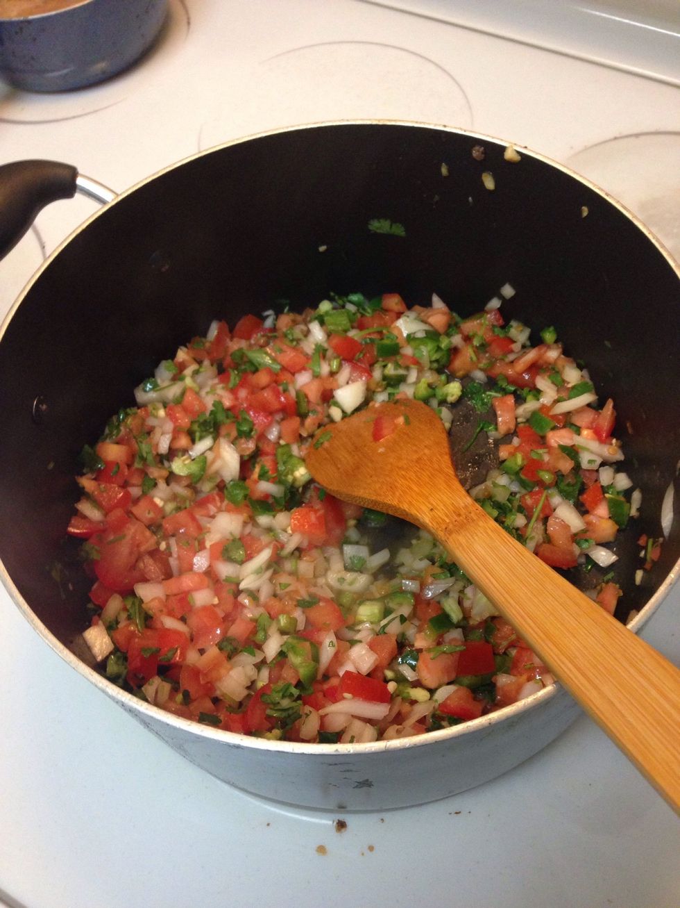 In the same pot, add just a little oil if not enough in there. Add veggies.