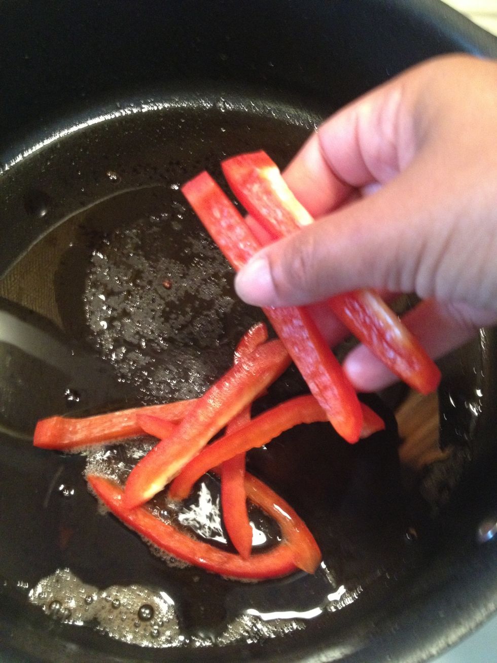In the same pot over medium heat, add the red peppers