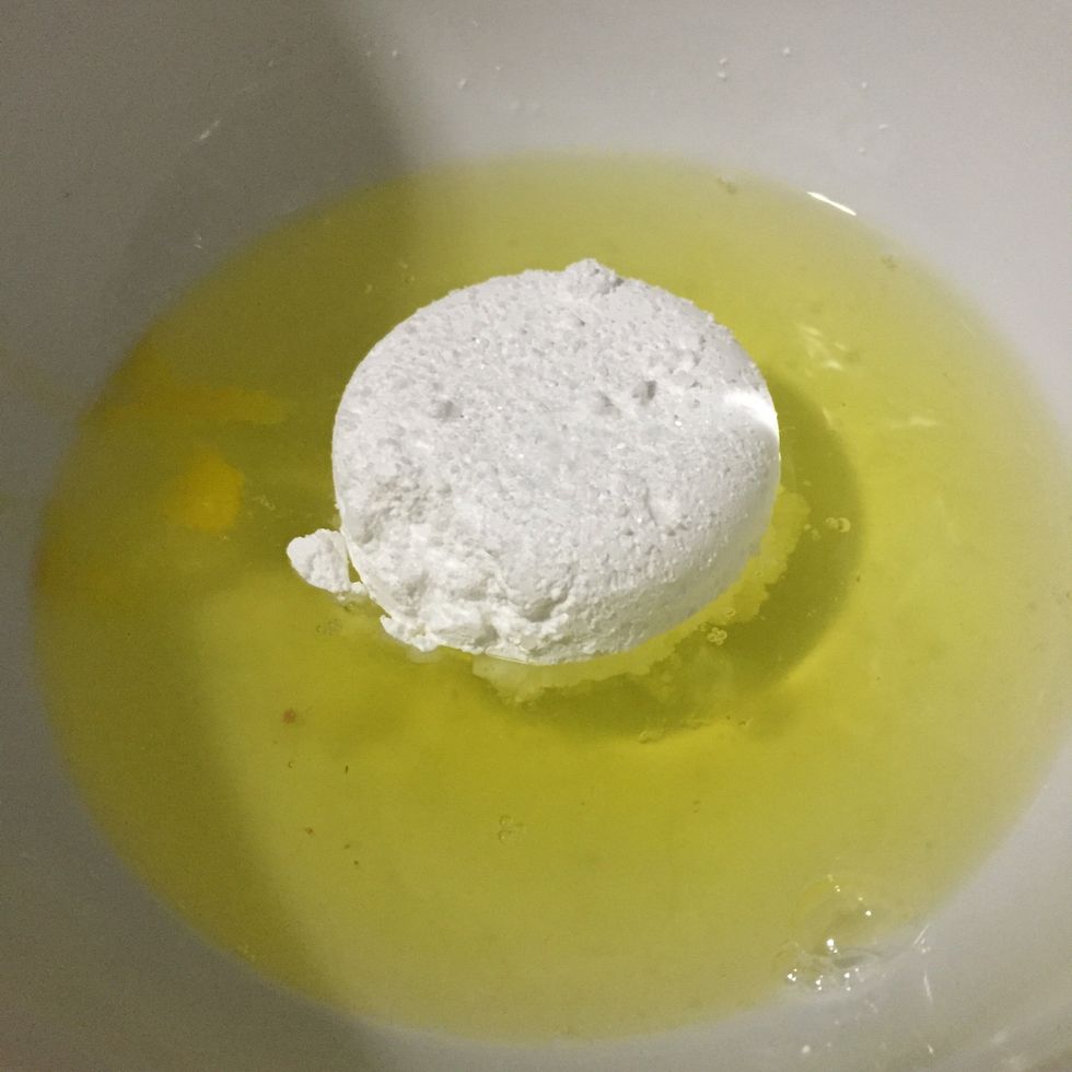 In the second bowl, whisk egg whites with 1/4 cup of sugar.