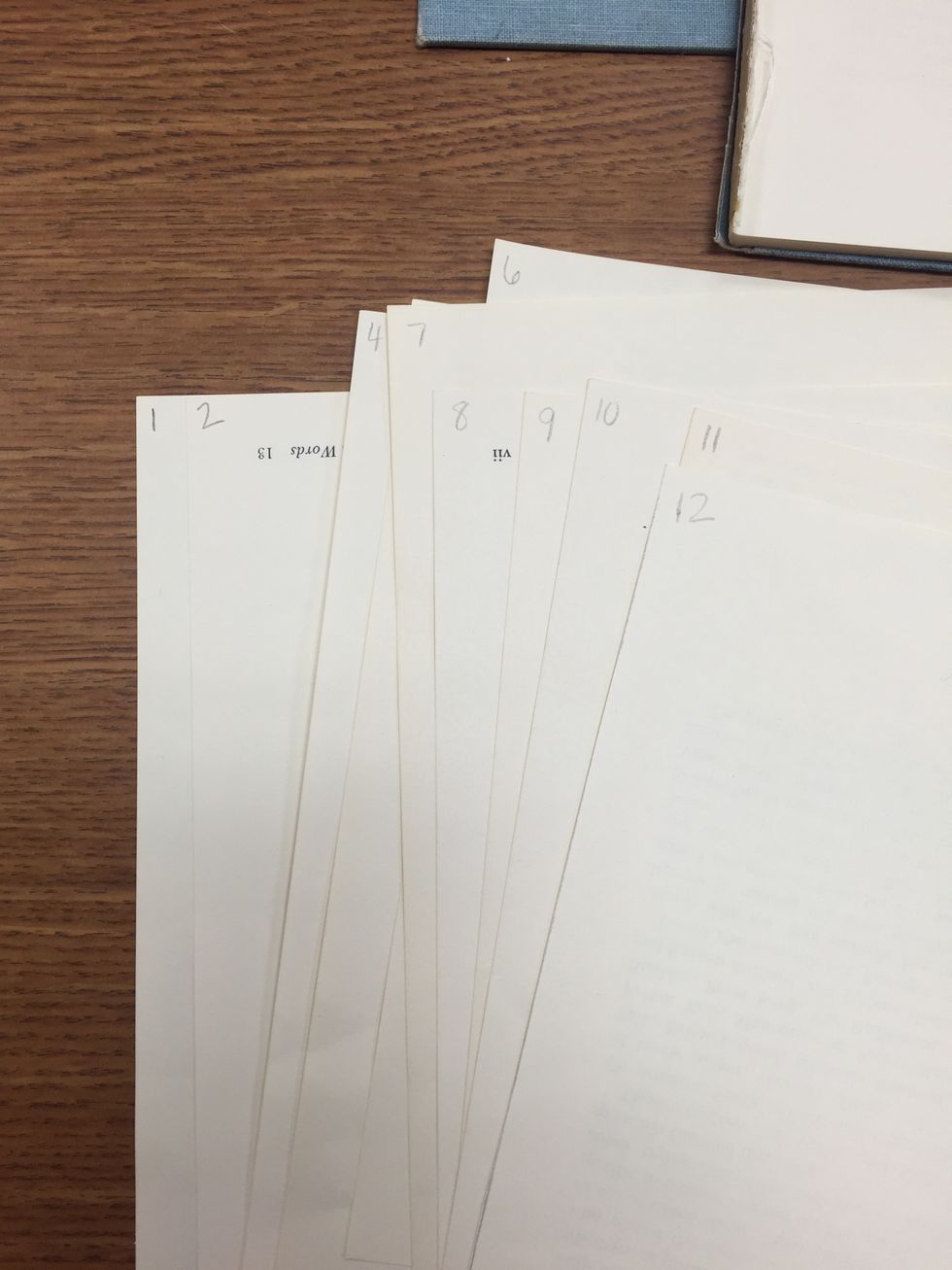 In the top left hand corner (one side only), I numbered each page, lightly using a pencil. DO NOT number on both sides.