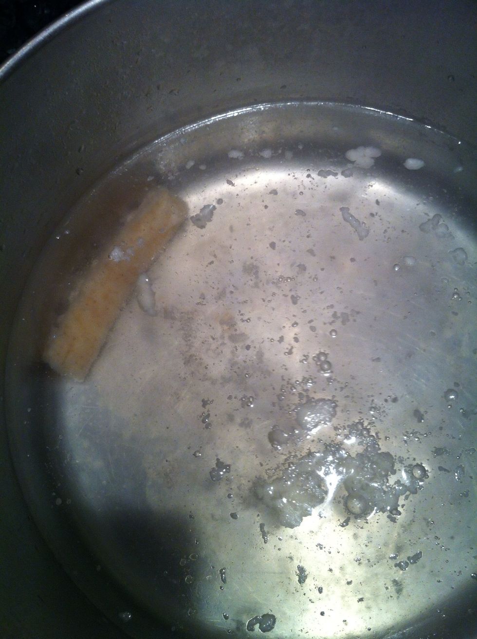 In the water for pasta I add the waxy end of Parmesan just to give the flavour of Parmesan to the pasta , it won't melt so you will need to remove it before serving