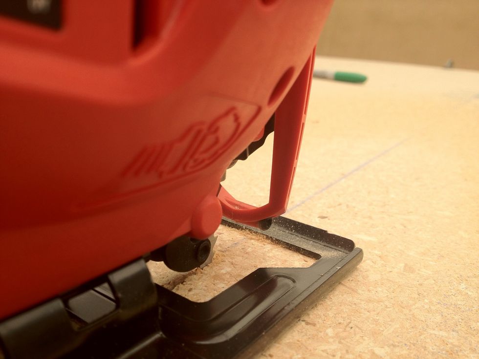 In this case we are reducing the width of the sheets from 48" (original size) to 40" (desired size) so we run a jigsaw to cut 8" off a long edge. (A circular saw is a better tool for this job!)