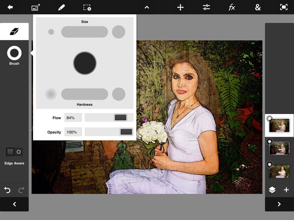 In this example, I chose to erase the background of Pencil Camera, the top layer, in order to reveal the Moku effect underneath on the second layer.