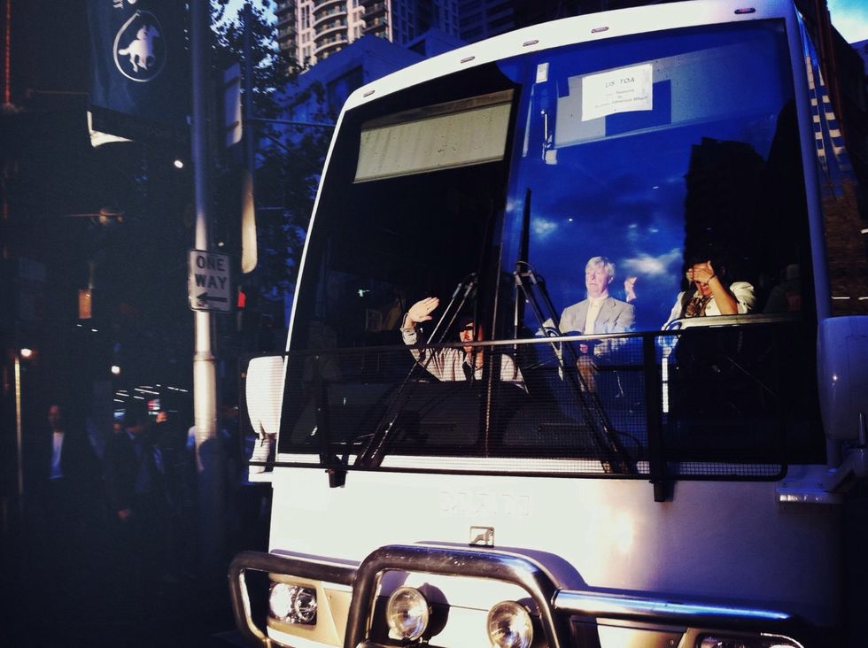 In this image the exposure is locked and the bus is not over exposed, and this helps us see the figure sitting in the light inside the bus. (Image copyright Oliver Lang).