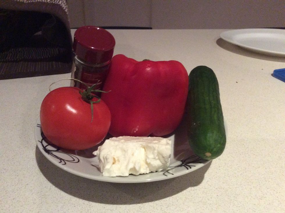 In this meal, you will need 1 tomato, 1 cucumber, 100 grams of feta, 1 capsicum & oregano OR you can use herbs.