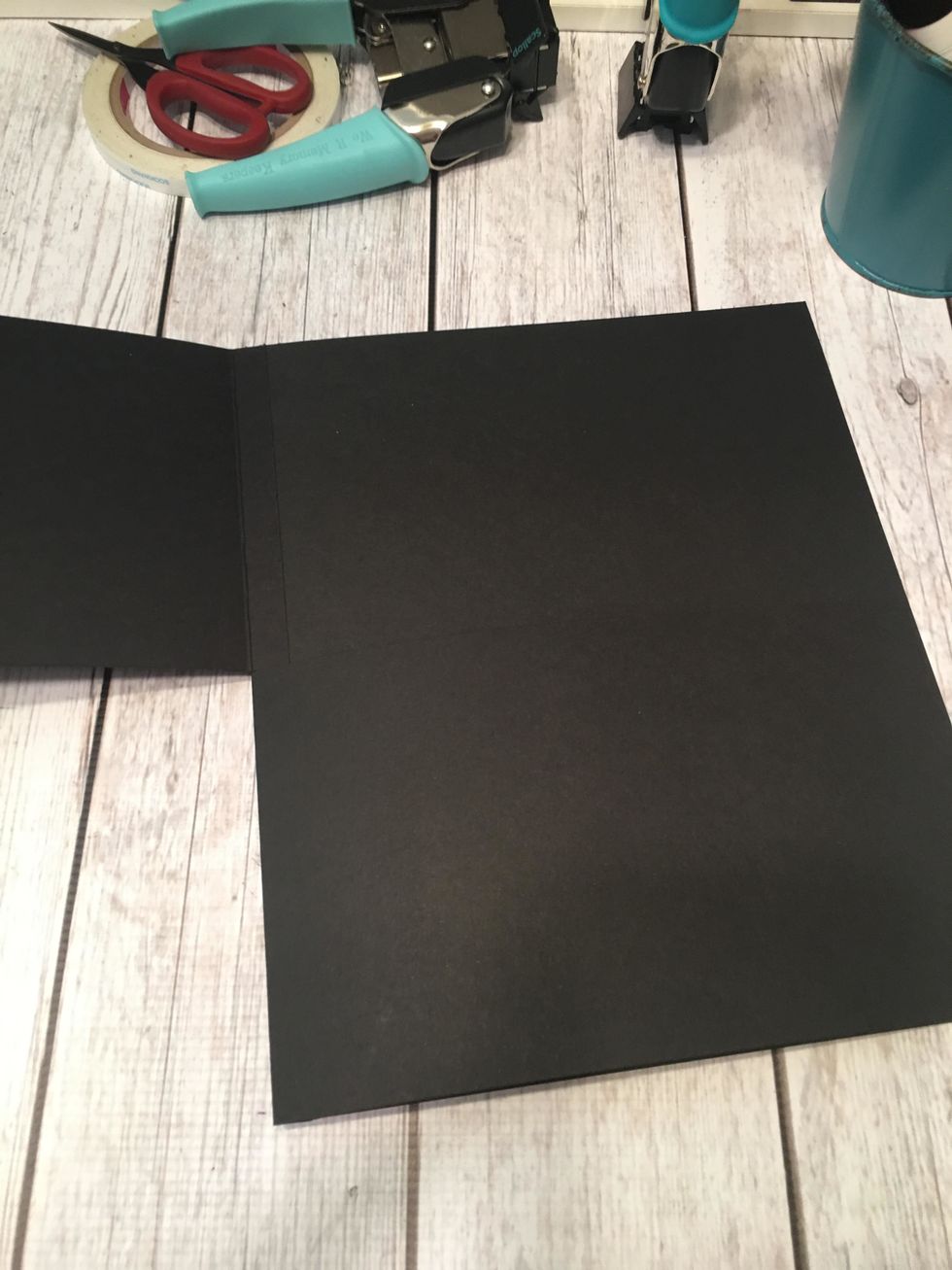 In this photo you can see the hinge when the top "half page is opened up.