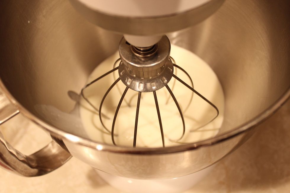 In your chilled mixer bowl, whip the whipping cream on medium speed until stiff peaks form. Don't over whip. Over whipped cream can be fixed with a splash of whipping cream and some re-whipping.