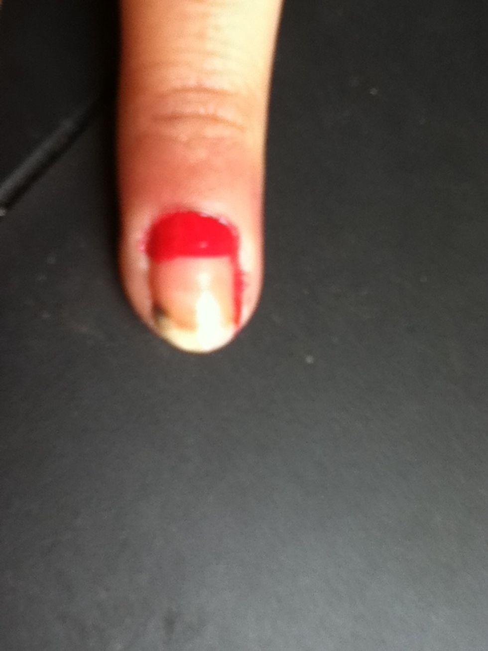 In your middle finger pain the top of your nail red and the right side to like so.