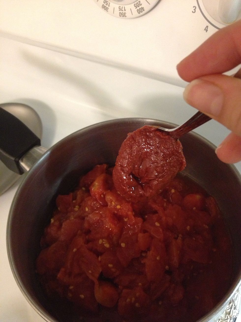 In your sauce pan use a big one I ran out of room, add the can of tomatoes and a little of the can of tomato paste
