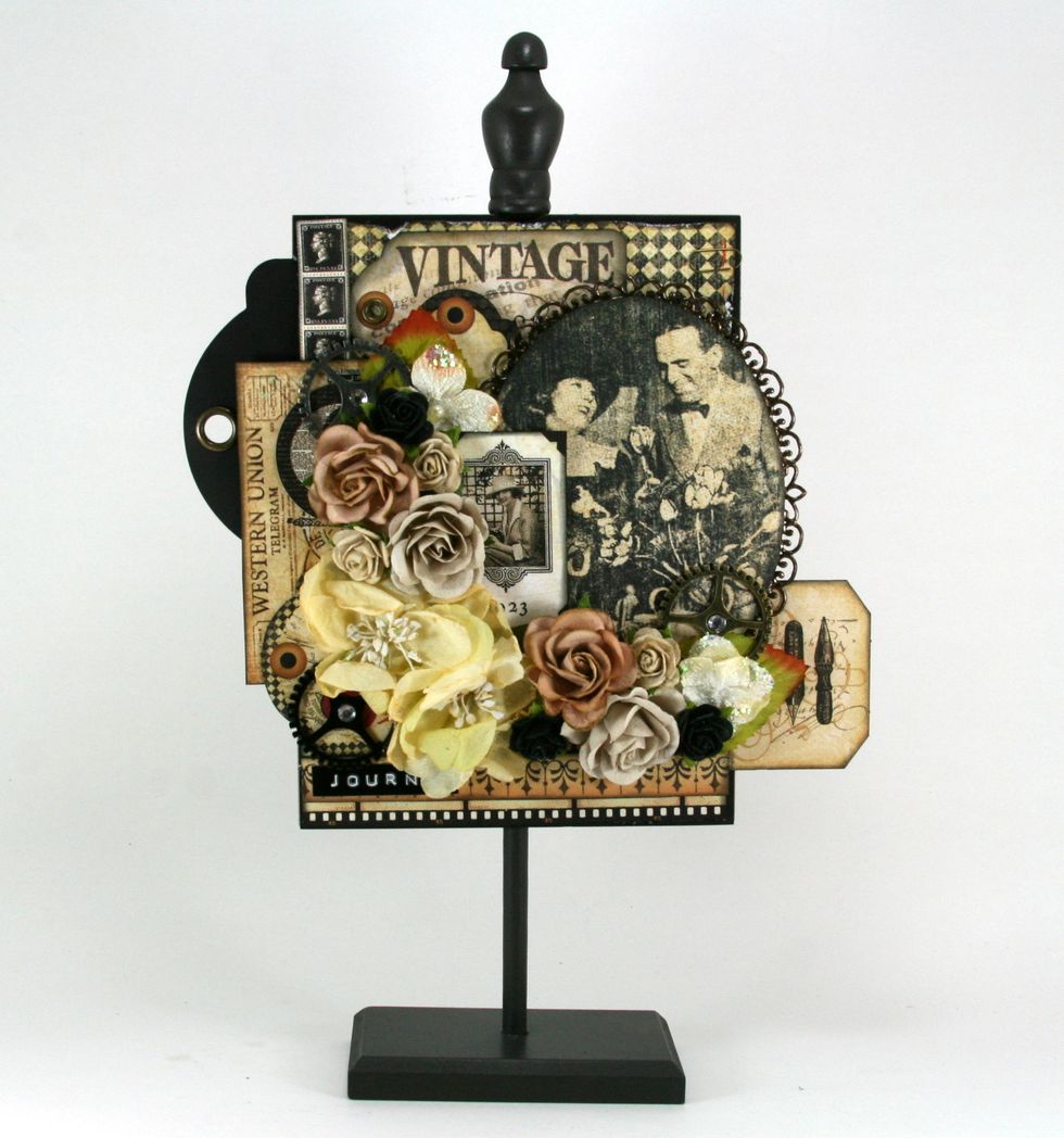 Include a few small black roses to anchor the light colors.