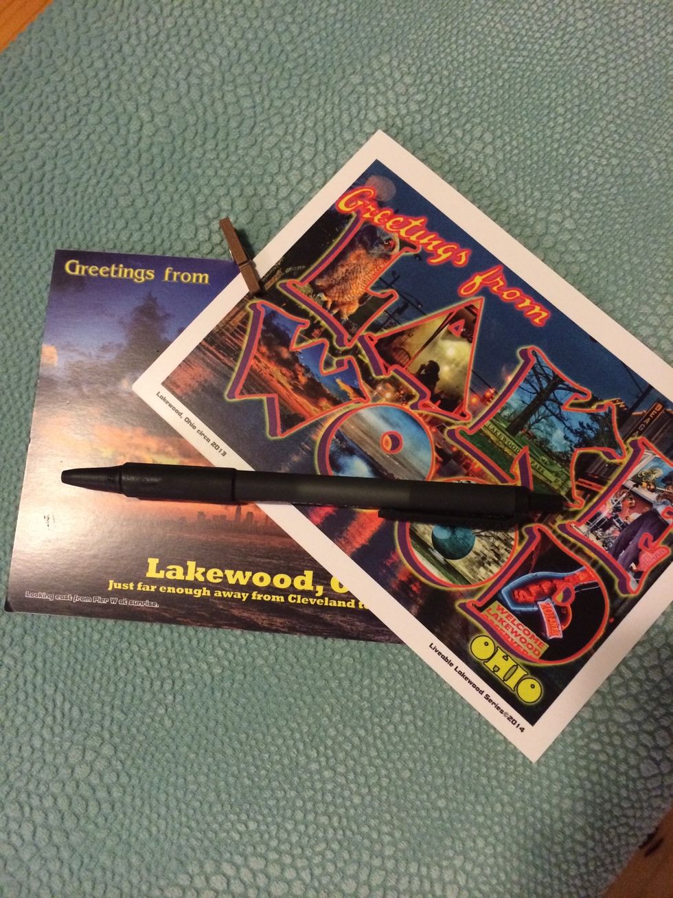 Include a pen or pencil and something to write on. I found these cute postcards for free at a local store!