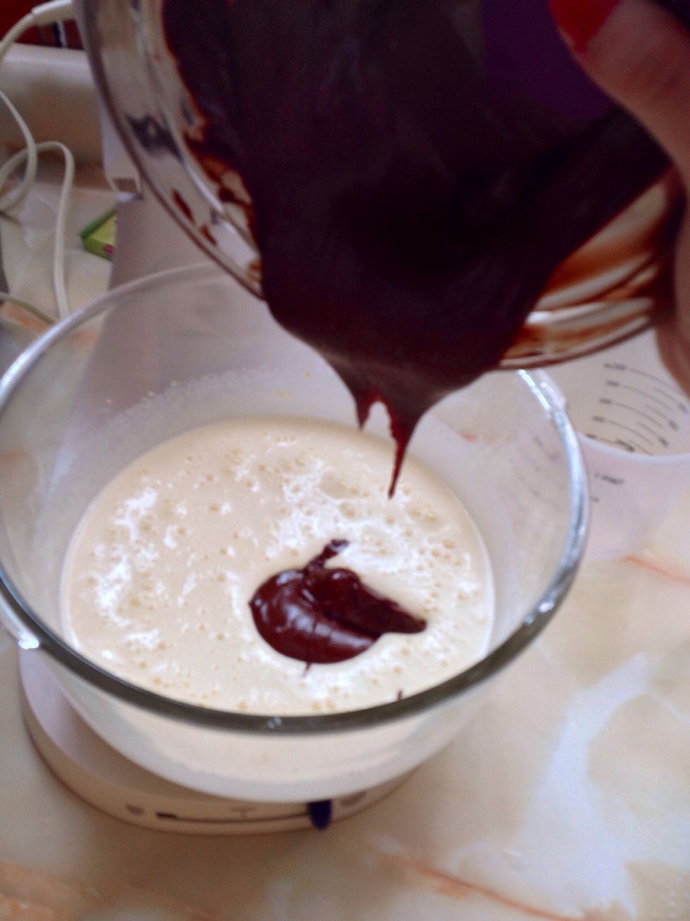 Incorporate the chocolate and whisk smoothly