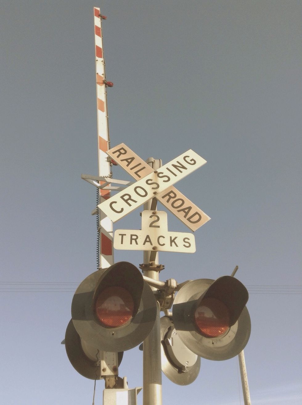 Increase color temperature generously. Reduce contrast yet again by 10-20%. Vintage films tend to have a warmer temperature palette. Early automatic cameras don't reproduce contrast well.