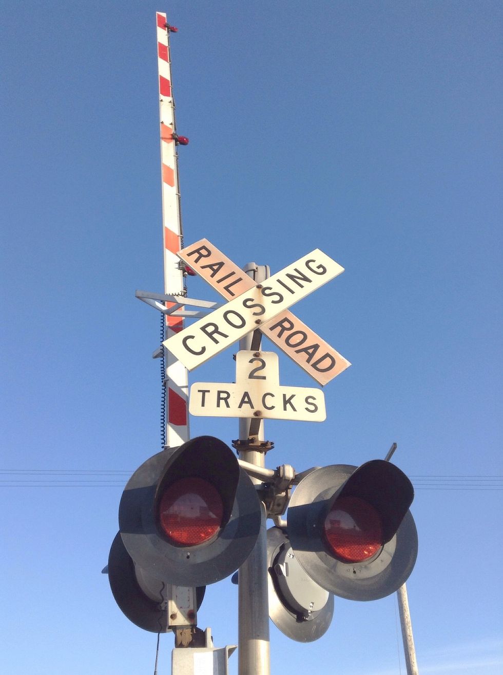 Increase exposure moderately. Reduce contrast by roughly 10-20% (depending on your software). This will assist in simulating the fade aged printed photographs posses.