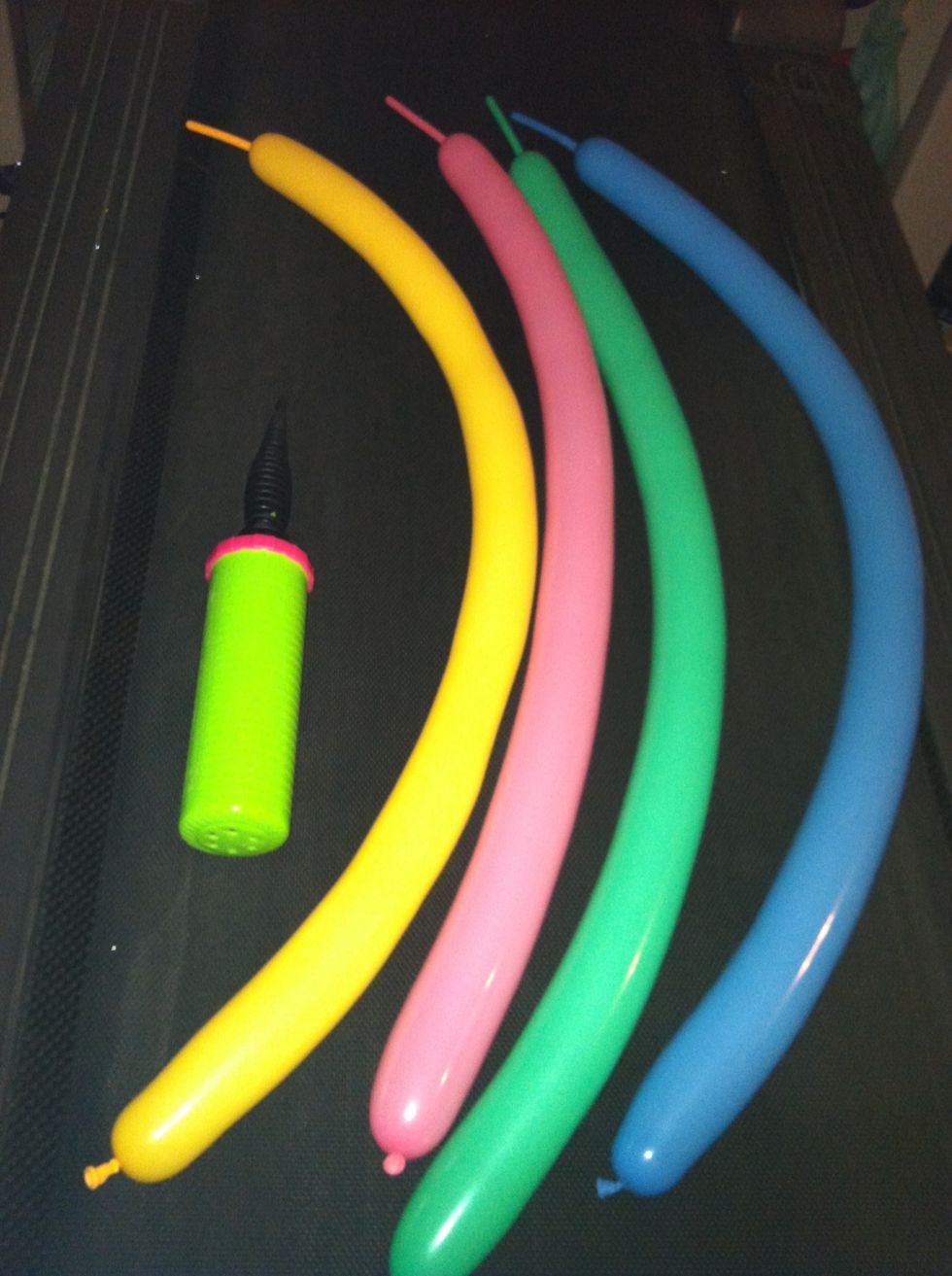 Inflate 260 balloons leaving a 3-4" tail