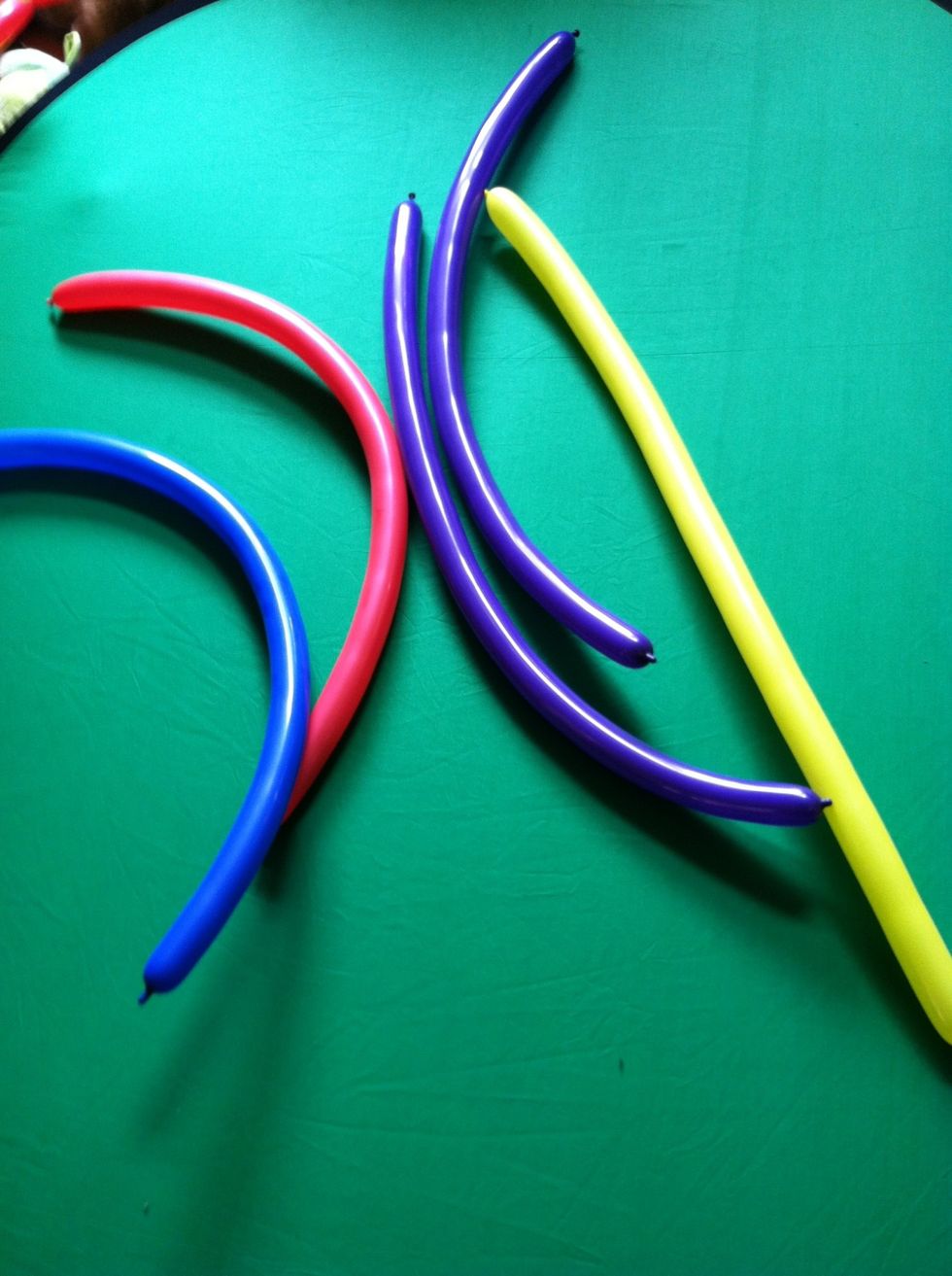 Inflate 5 "260" balloons almost fully- leaving a 1/4" uninflated and giving them a good burp