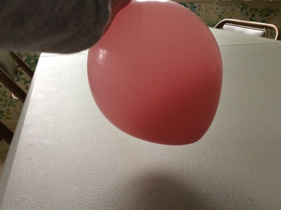 Inflate the balloon and then let all of the air out