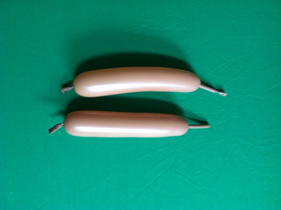 Inflate the two half mocha balloons to about 5"
