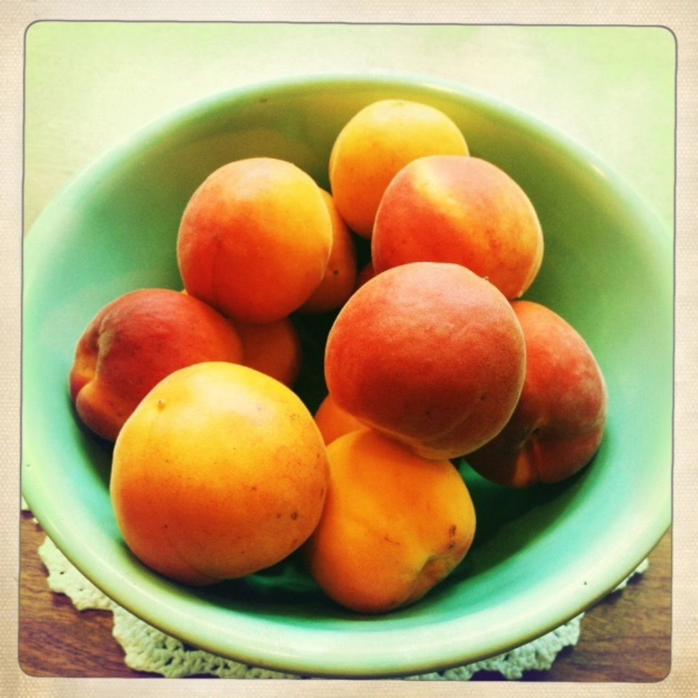 Ingredients:  1 cup -- half cr\u00e8me fraiche or sour cream and half canola oil.  1 cup - flour.  1 cup sugar. Pinch of salt. Six eggs. As many apricots as you need.