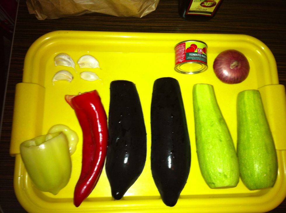 Ingredients: 2 small zucchini 2 small eggplants 2 different coloured paprika 1 medium onion garlic, tomato paste, olive oil, salt. Some feta cheese for serving.