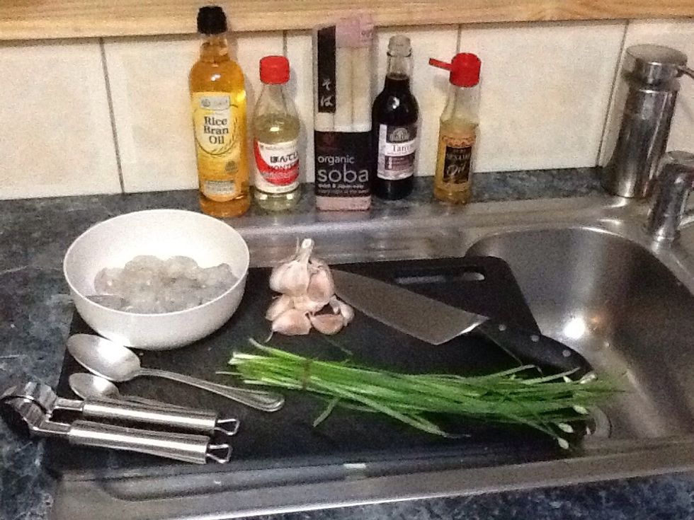 Ingredients 500g of green prawns 2 tbsp, rice bran oil 2 garlic cloves, crushed 2 bunches of garlic chives 2 tbsp, tamari soy sauce 1 tbsp, mirin 1 tsp sesame oil 1/2 packet soba noodles Coriander.