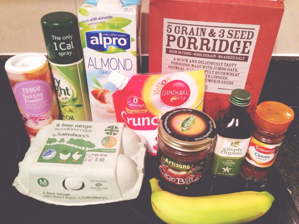 Ingredients: almond milk, egg, oats (processed), banana, baking powder,cloves, fry light. Canderell, vanilla extract, cacao butter (to serve)