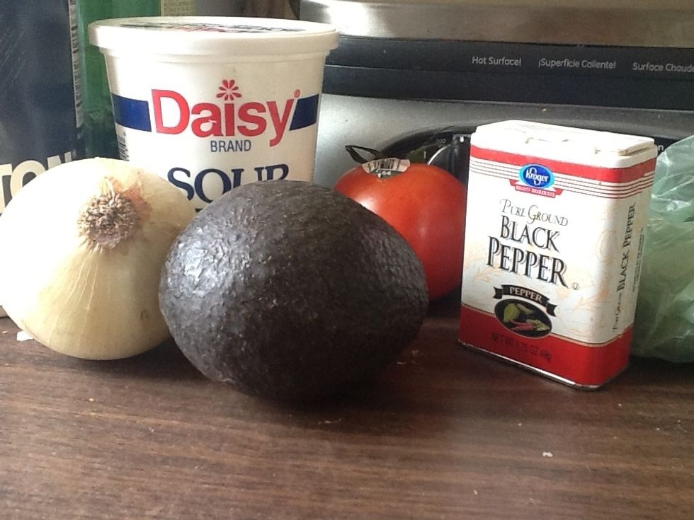 Ingredients: avacado, half tomato, half onion, one teaspoon sour cream, salt, pepper, lemon/lime, cilantro