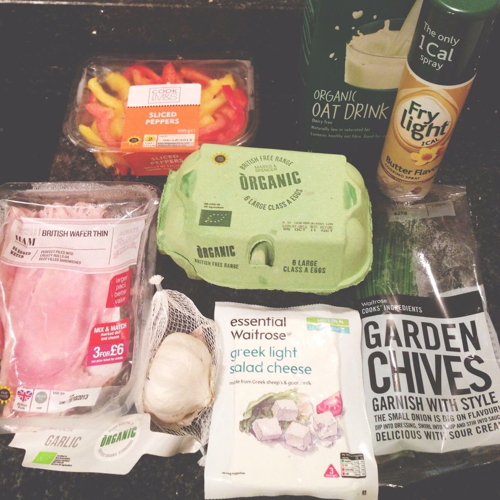 Ingredients: Eggs, oat milk, low fat ham, fry light butter, Herbamare, sweet peppers, low fat feta cheese, garlic, chives